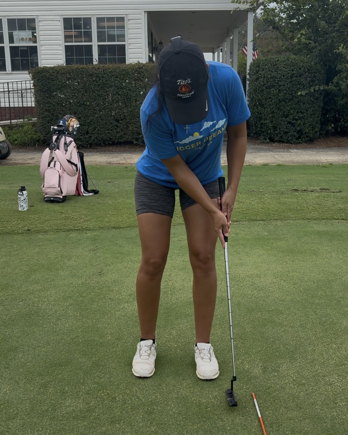 Christina Rivera, a Ladies of the Links member, practicing her putting.